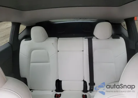 2024 Tesla Model Y from USA, damaged, VIN 7SAYGDED4RF153032